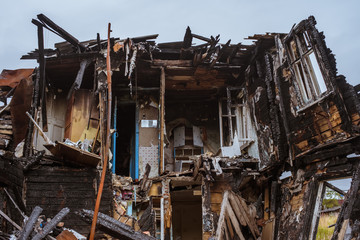 the old wooden burned-down house a view from inside