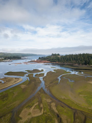 Aerial view of a small town, Port Hardy, during a cloudy summer day. Located in Northern Vancouver Island, BC, Canada.