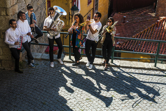 Jazz Band, A Group Of Musicians Play Music In The Old Downtown Of Porto, Portugal.