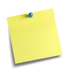 A blank yellow reminder notice paper tacked to a board