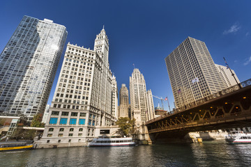 Fototapeta na wymiar City buildings and skyline over the Chicago River Illinois USA