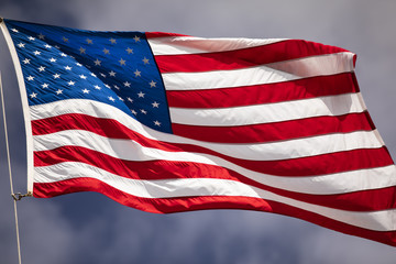 Flag of the USA flies in the wind