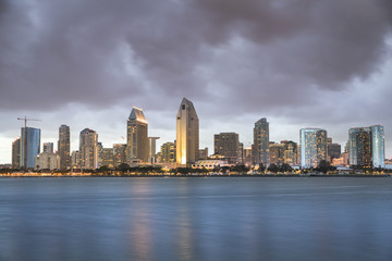 Naklejka premium City centre over San Diego Bay at night in California USA