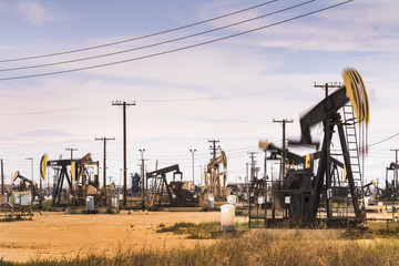 Crude oil pumps natural resources from the ground in California USA