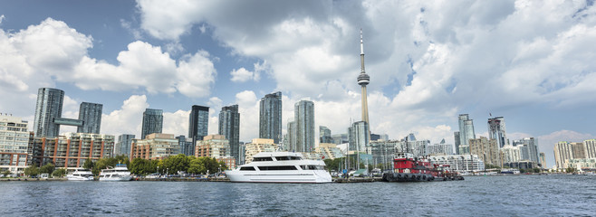 Downtown panoramic city view of Toronto Canada from Queens Quay and Lake Ontario