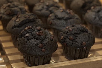 black cupcakes on a pallet
