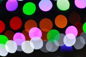 Abstract colorful bokeh lights background.
