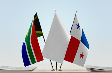 Flags of Republic of South Africa and Panama with a white flag in the middle