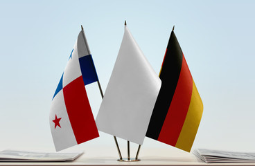 Flags of Panama and Germany with a white flag in the middle