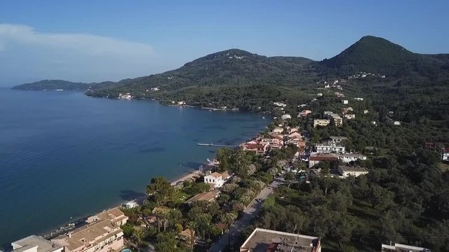 Greece, Corfu Island, drone footage of Messonghi Beach, Moraitika. Rise Shot.