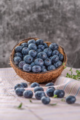 Fresh ripe wild blueberries in bowl. Wild blueberry in top view flat lay with copy space for background or wallpaper. Blueberry is antioxidant food and vitamin C.