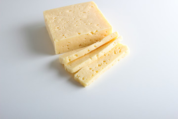 cheese cut into white background