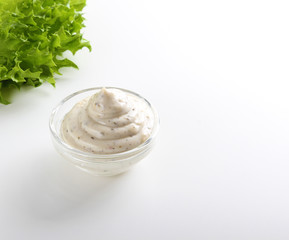 mayonnaise sauce, sour cream on white background