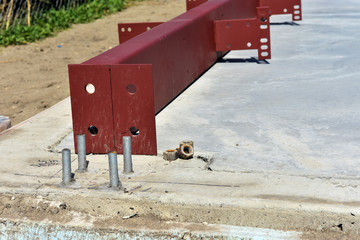  Steel building material ready for installation at commercial building site.