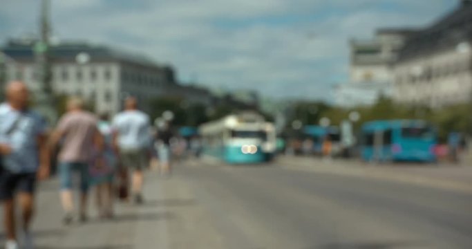 Blurred people, trams and cyclists in central Gothenburg