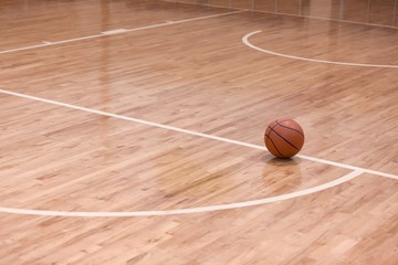 Basketball Ball on Basketball Court © BillionPhotos.com