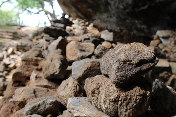 Rock balancing around the way to the top of Pidurangala Rock to see Sigiriya.