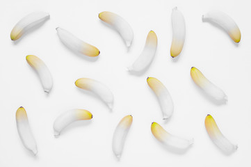 White background with small yellow bananas