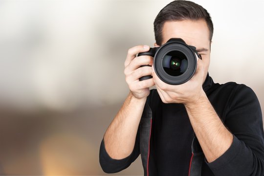 Closeup of a Photographer Taking Photos