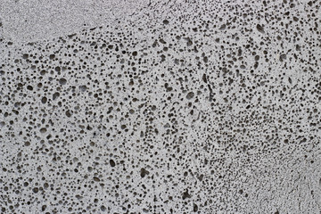 dark gray foam concrete close-up, texture, background, material with copy space.