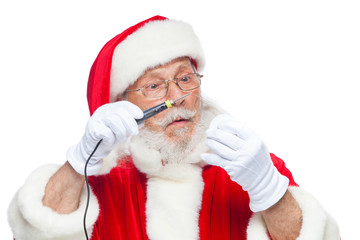 Christmas. Santa Claus in white gloves holding a soldering iron with a solder. Electronics, equipment repair. Ad of a master on equipment repair. Isolated on white background.