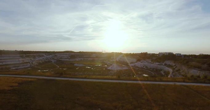 Sunset over limestone quarry