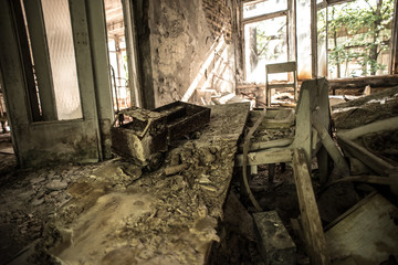 Fototapeta na wymiar The abandoned buildings of the dead city of Chernobyl