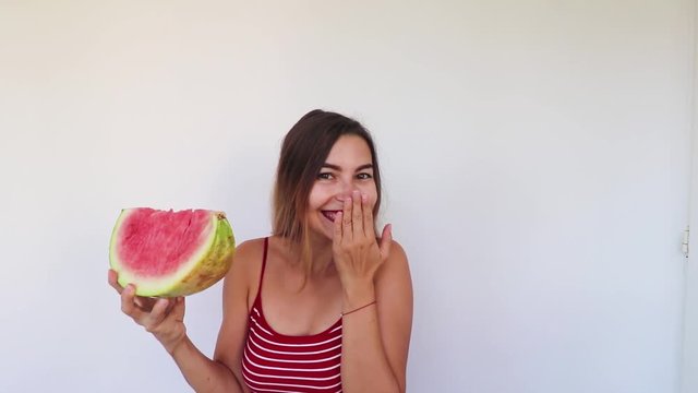 Beautiful Girl in Red Top Doing Ooups With Watermelon in Slow Motion