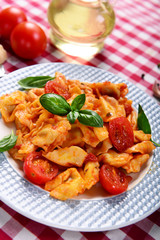 Traditional italian dish - tortellini with tomato sauce