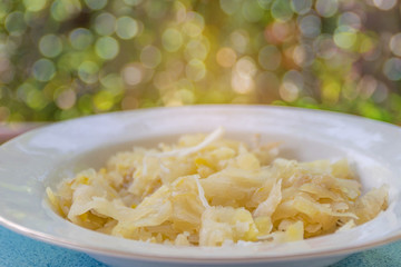 Soft blurred and soft focus of Dioscorea hispida Dennst.,Dioscoreaceae, wild yam, cook on the plate with the bokeh, beam, light and lens flare effect tone. Local food in Thailand.