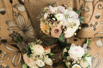 Beautiful wedding bouquet with different flowers, roses