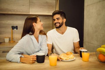 Fototapeta na wymiar Couple enjoying a breakfast together at home.
