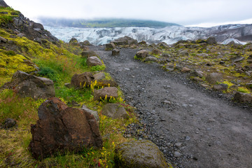 Blue ice at the hidden Svinafellsjokull glacial lagoon, Vatnajokull, Iceland