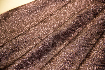 Brown fabric for dress, With patterns In the form of roses