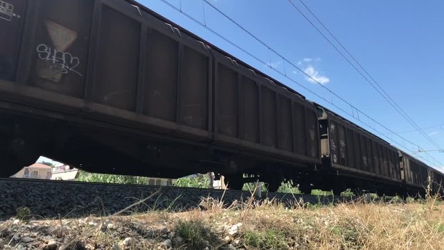 05 09 2018 Pineto, Abruzzo - freight  train in a sunny summer day seen from below