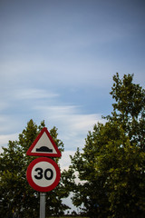 Bump traffic signal on a nature landscape background