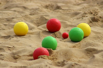 Games on the sandy beach with balls 