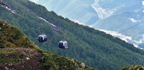 aerial tramway with a cabins in mountains