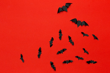 Fototapeta na wymiar halloween and decoration concept - paper bats flying