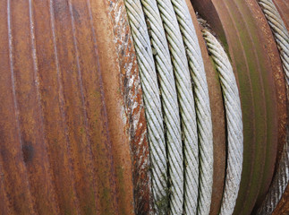 rusty coil or spool with a steel cable