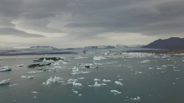 View over the J&radic;&part;kuls&radic;&deg;rl&radic;&ge;n, a glacier-lake in Iceland with a lot of icebergs