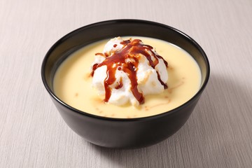 bowl of whipped egg, custard cream and caramel