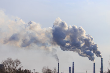 Smoke from the pipes of the factory