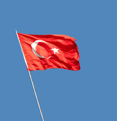Turkish flag waving in blue sky, Istanbul, TURKEY