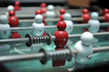 close up of Table football game, Soccer table with red and white players, selective focusing. 