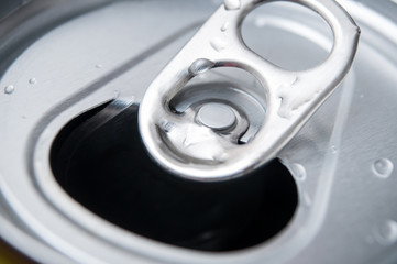 closeup of metallic can opening on top view