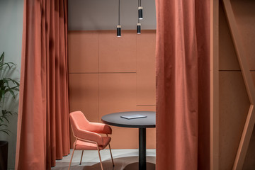 Office in loft style with orange meeting zone