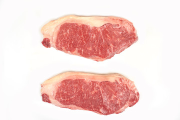 fresh raw steak isolated on white background.