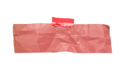 Crumpled pink paper with red tape isolated on white background, clipping path