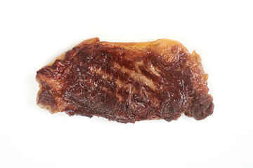 Grilled beef meat isolated over white background.